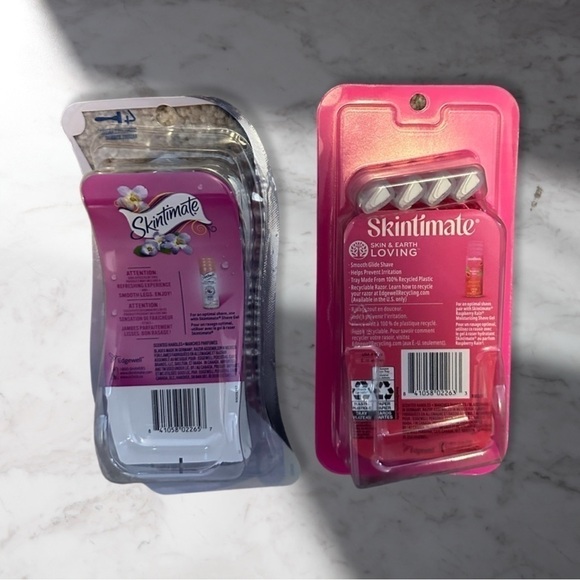 Two Four-Pack Skintimate Disposable Razors. Exotic Violet Blooms& Raspberry Rain - Picture 2 of 2